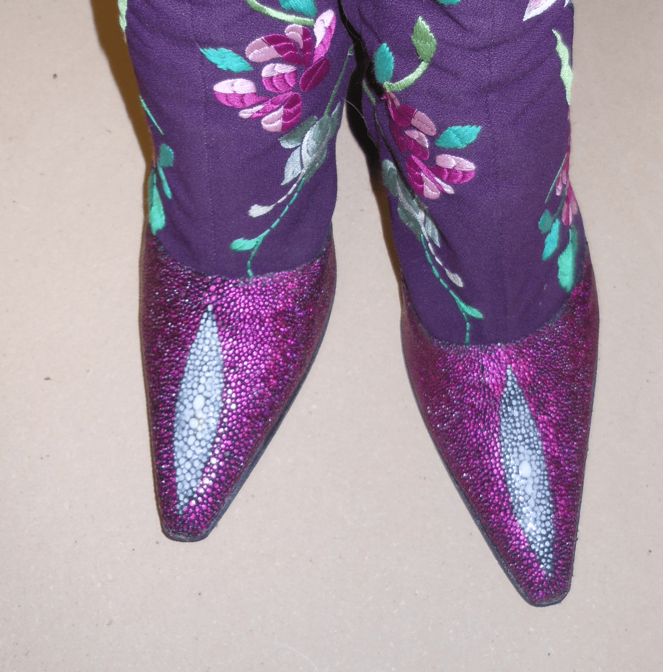 Covered worn fabric with Stingray and replaced soles and heels.